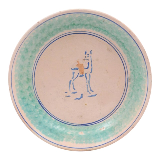 1910s Northern Italian Pottery Platter with Blue Deer Motif and Weathered Patina For Sale