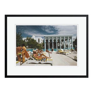 Armando’s Beach Club 1975 by Slim Aarons Framed C Print For Sale
