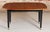 Mid Century G-plan Librenza extending dinging table in tola and black, circa 1960s. The extension leaf is stored...