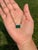 This pendant necklace features a 6.9 carat octagon natural emerald set in 14k yellow gold. The emerald measuring about...