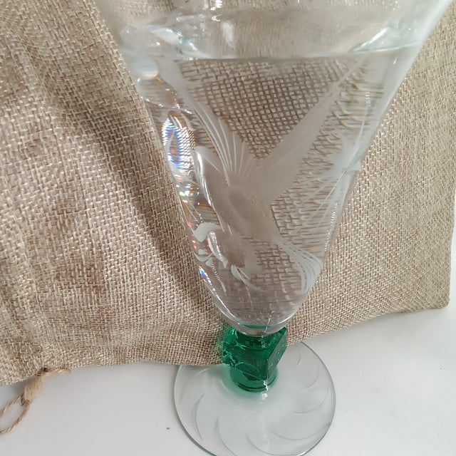 Glastonbury "Bird of Paradise "schedule clear glass featuring a green uranium glass stem.Produced during the Depression...