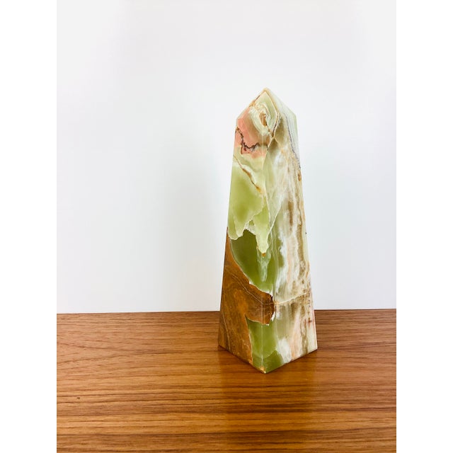 Vintage Solid Onyx Stone Obelisk Statue made of onyx green, light brown & cream in color carved into an obelisk shape...