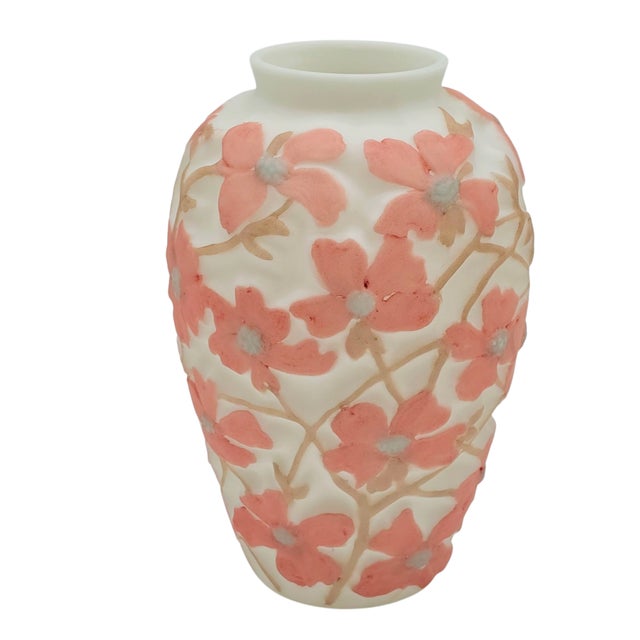 An ivory field of satin glass, whisper-soft beneath the fingers, rises in delicate relief—each blossom a fleeting echo of...