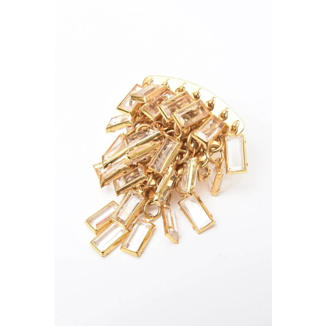 This is part of Chairish’s Costume Jewelry assortment. These wonderful and dramatic Italian vintage cascading pair of clip...