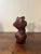 A sculptural hand carved mahogany female torso, celebrating the natural curve and form of the body. Carved from a solid...