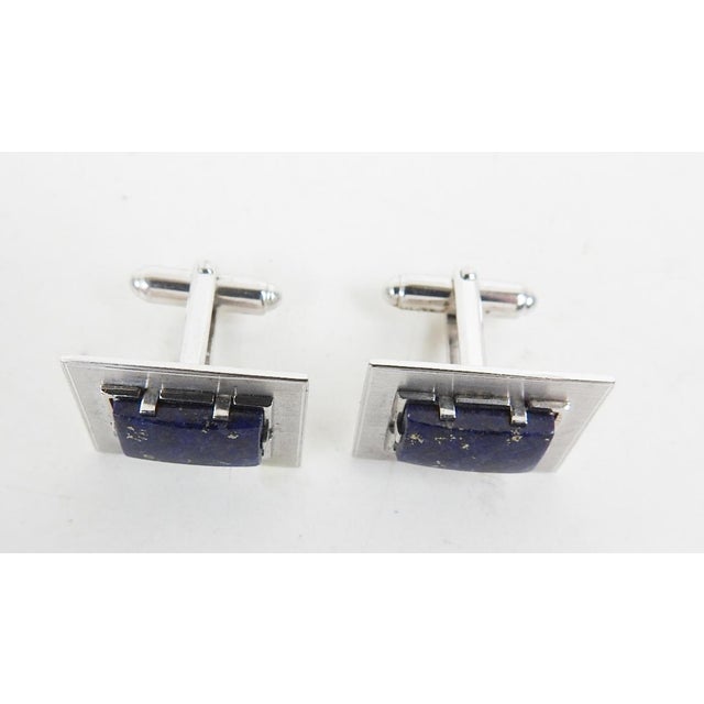 Vintage mid 20th century Anson cufflinks with faux lapis lazuli in chrome setting. Each is 7/8" x 5/8", good condition.
