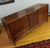 Here's a super sleek nine drawer sideboard or long dresser created by American of Martinsville. Has a contemporary Asian...