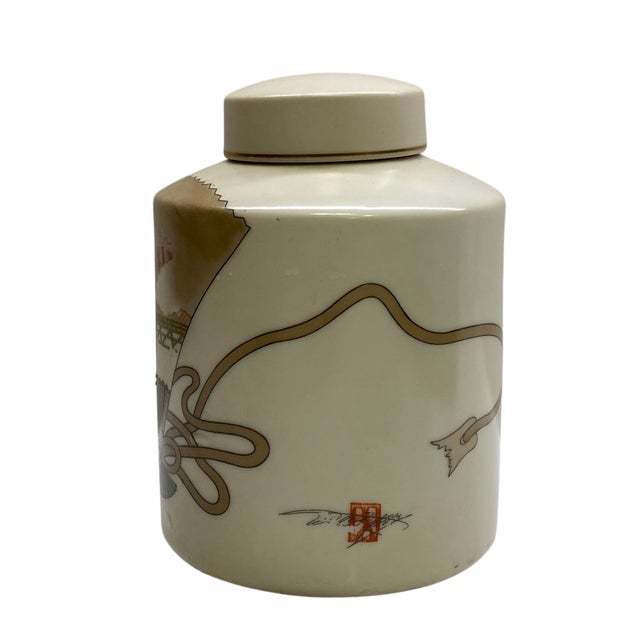 Decorative vintage porcelain ginger jar from the Sen-Su collection for The Maldon Group. The lidded vessel features an...