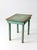 This early 20th century Primitive painted side table features a beautifully weathered turquoise surface with layers of...
