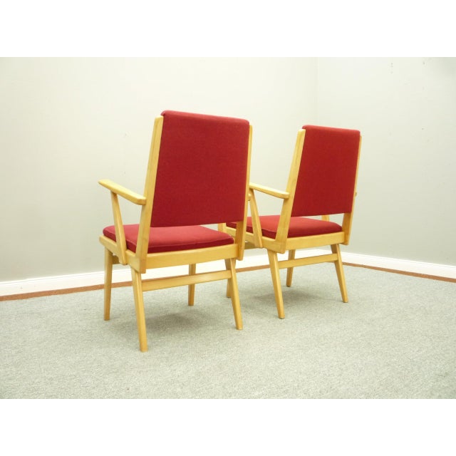 Nice armchairs from 1962. The seat and backrest were renewed 3 years ago. Frame made of solid beech wood with minor signs...