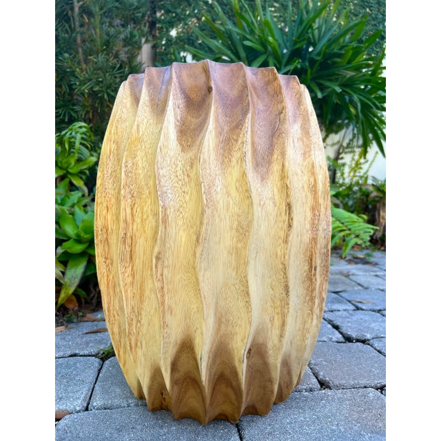 Organic Modern sculptural side table with fluted design. This versatile piece can be used as a stool, a pedestal, or a...