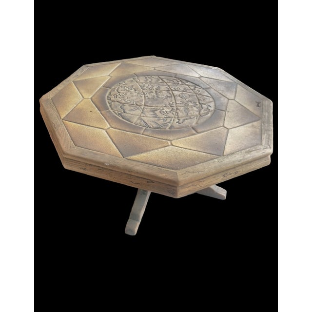 Octagonal table with four central legs with elm structure and top in Vallauris ceramic stoneware tiles and signed by the...