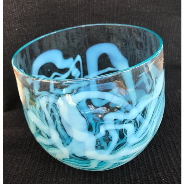 Decorative handblown bowl in rare exuberant white ribbon pattern on sky blue glass. Harkness was a renowned American...