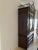 Gorgeous mahogany and stained rattan armoire with chinoiserie accents. The quality of the wood and rattan is obviously...