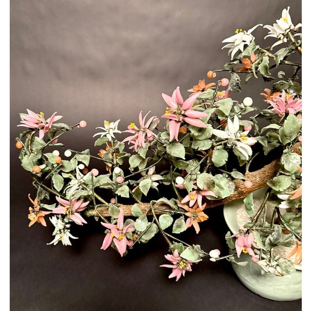 This exquisite Chinese Republic jade, glass, and hardstone flower bonsai tree is a stunning example of mid-20th century...