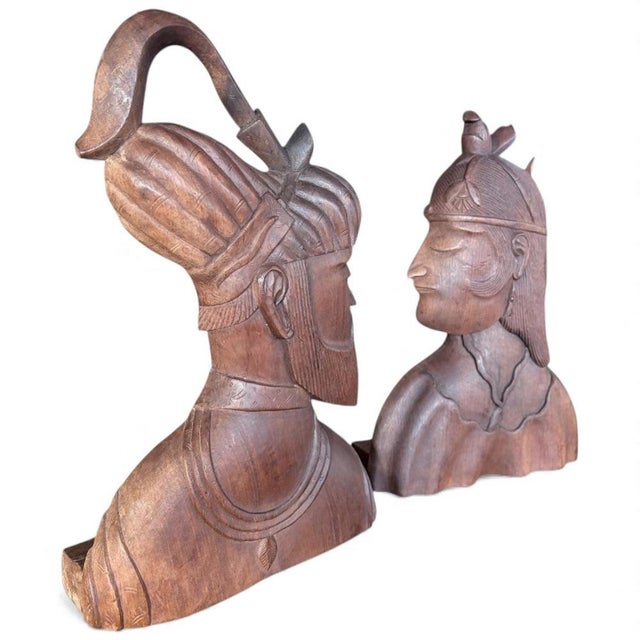 Ottoman Empire busts are exquisitely captured in this pair of hand carved sculptures, offering a unique blend of mid...