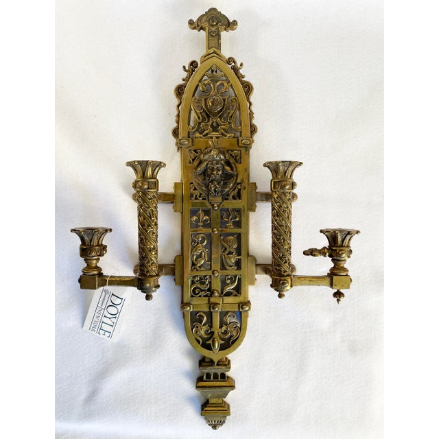 A remarkable and unusually large pair of original 19th-century Renaissance Revival sconces with dramatic Baroque...