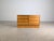 Beautiful small vintage chest of drawers made of high-quality walnut for sale. This small sideboard dates back to the...
