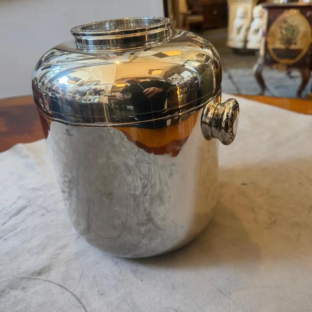This extraordinary 1970s wine cooler by the prestigious Italian silversmith Cesa 1882 is a pinnacle of mid-century barware...