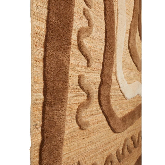 Flat weave rug in a blend of hemp and jute, with 100% hand-knotted New Zealand wool shag pile overlay. Designed for an...