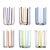 Clear glass tumblers and accessories. From the bottom of the glass, lines of alternating colors curl upwards like two-tone...