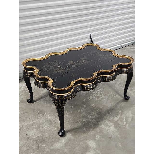 Stunning Chinoiserie style ebonized coffee table by E.J. Victor Premier Furniture Crafters. Featuring beautiful...