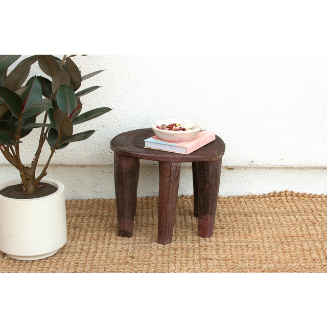 A unique piece of African art, this vintage Nupe table from Nigeria is a must-have for collectors and enthusiasts of Nupe...