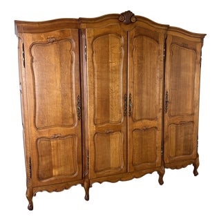 Vintage French Louis XVI Style Carved Oak 4-Door Wardrobe For Sale