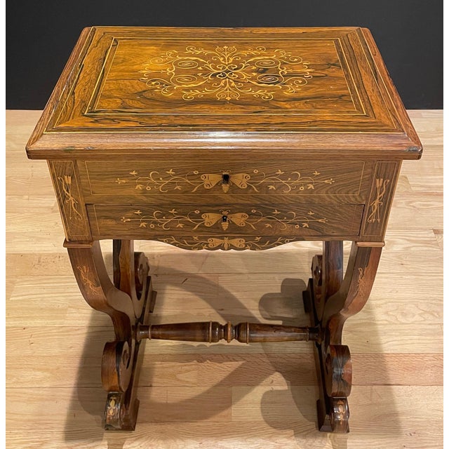 Fine quality Regency style 19th century rosewood and marquetry work table. Interior with individual compartments and...
