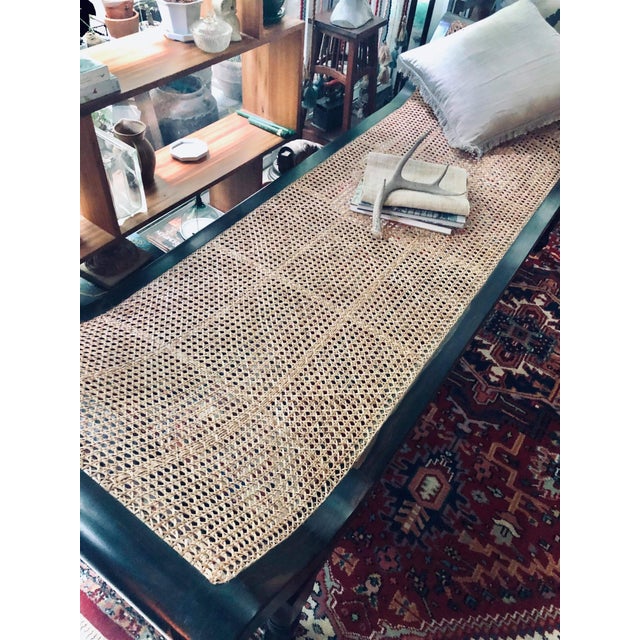 A Kamagong Divan (New) kamagong, narra, lanite, and rattan Dimensions: 28” x 82” x 17.5”