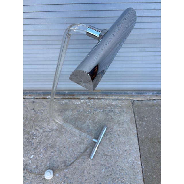 Peter hamburger Lucite and Chrome Floor Lamp. Elegant simple design that can easily be moved around your chair to give...