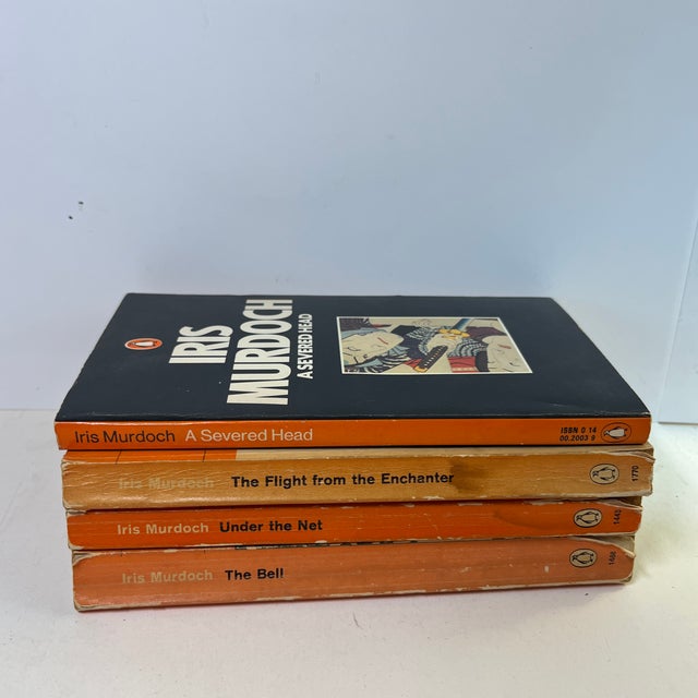 Vintage set of four soft cover books by Iris Murdoch published by Penguin Press: A Severed Head, The Bell, Under the Net,...