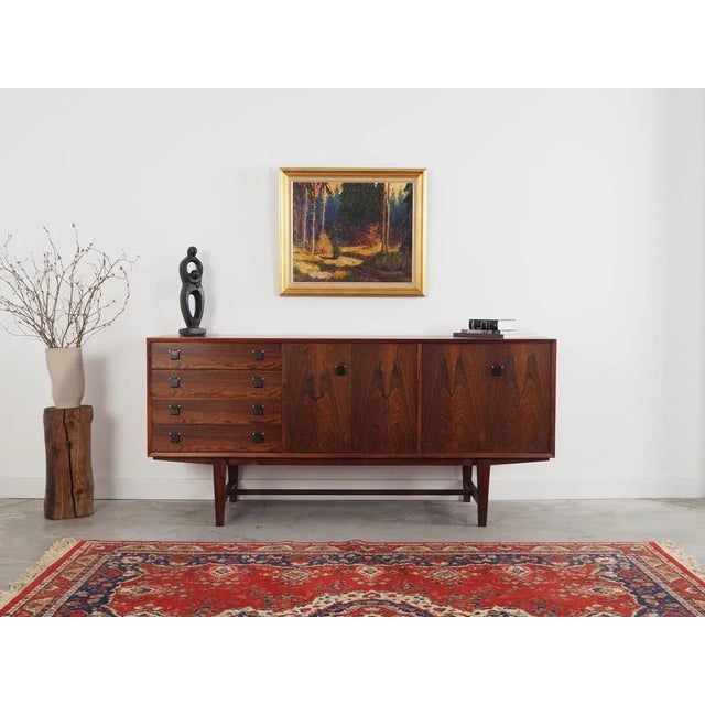 The painting was made using oil on canvas technique in the 1960s. The frame was made of wood. The painting is maintained...