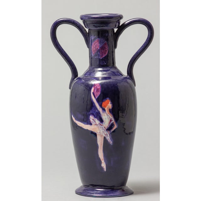 An elegant pair of tall circular ceramic vases with large handles, hand-crafted in clay by Irish artist Gabrielle. Each...