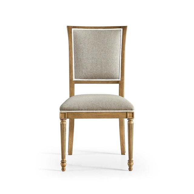 Crafted with meticulous attention to detail, this chair features a sophisticated sunbleached Cherry wood finish and...