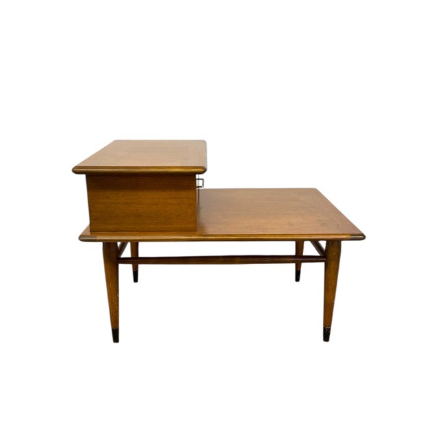 A finely crafted vintage end table by Lane Furniture, dating to the mid-20th century and emblematic of classic American...