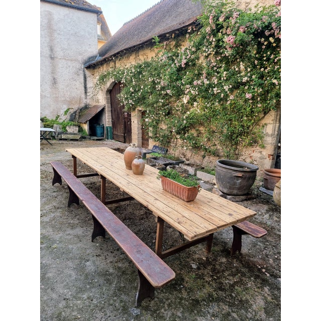 Large antique French dining table dating from approximately 1900–1920, originally intended for communal dining, village...