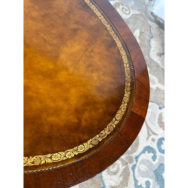 English Vintage Regency Style Oval Leather Top Flame Mahogany Coffee Table on Casters. By Weiman. For Sale - Image 3 of 11