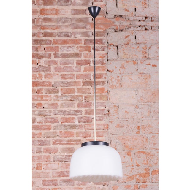 This timeless chandelier is an elegant representative of the Brussels style and Mid-Century modernism, which brought...