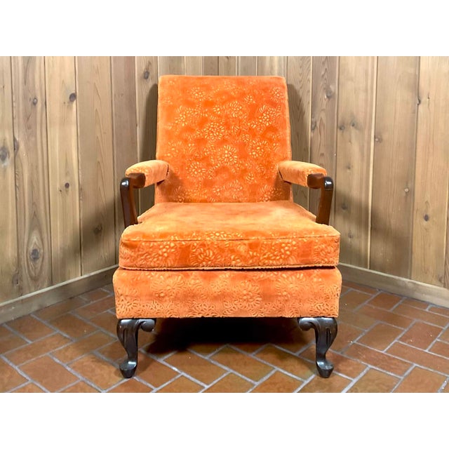 Gorgeous vintage mid-century armchair and matching ottoman set upholstered in a vibrant burnt orange crushed velvet fabric...