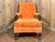 Gorgeous vintage mid-century armchair and matching ottoman set upholstered in a vibrant burnt orange crushed velvet fabric...