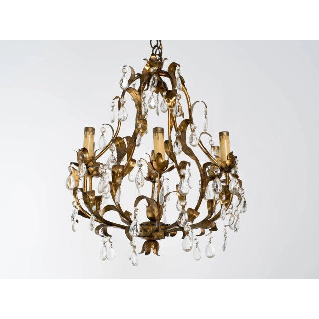 Gilt metal and crystal chandelier.