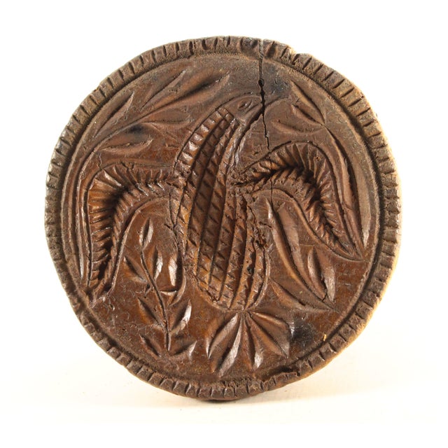 A beautiful antique butter print stamp with a handle All hand made from one piece of turned hard wood It displays a RARE...