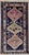 Hand-knotted tribal rug from the Luri tribes of western Iran, featuring three large geometric medallions aligned along the...