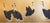A sophisticated hand painted scenic wallpaper mural featuring graceful cranes set against a rich metallic gold background....