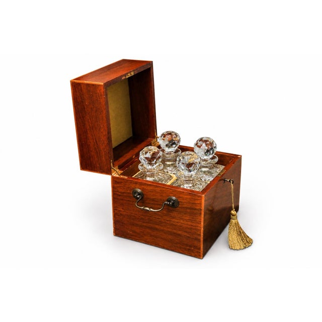 Victorian sheraton revival mahogany decanter box, with four atlantis decanters with hanging handles the hinged lid with...