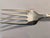 A sterling silver serving fork/cold meat fork by Tiffany in the simple but elegant "Windham" pattern, patented 1923,...