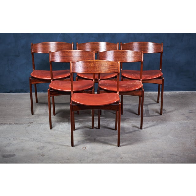 Beautiful vintage dining chairs in rosewood by Danish designer, Erik Buch.The chairs features a frame in great quality,...