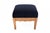 Mid-20th-century armchair with footstool, scandinavia. an elegant wingback armchair with a matching footstool, originating...