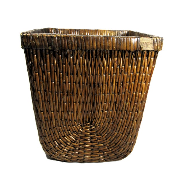 I just love cool old vintage baskets. This one has a unique weave pattern and is rounded on the bottom corners. It is old...